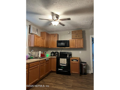 Charming fixerupper with huge upside! This property offers an - photo 3
