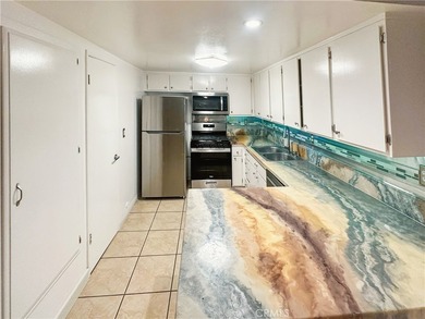 Rarely available two-story, 1-bedroom, 1-bath townhouse with no - photo 3