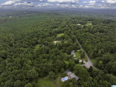 Tucked away on 4.3 peaceful acres in Montevallo, this