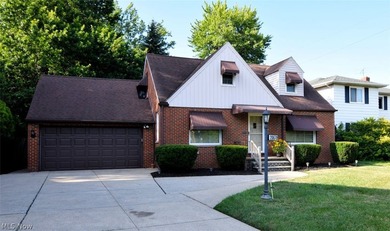 This charming and well maintained brick home has been in the - photo 1