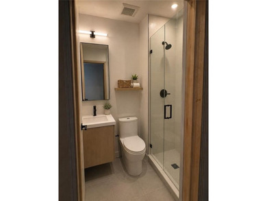 The Bedford Flats is a mixed-use investment comprised of two - photo 13
