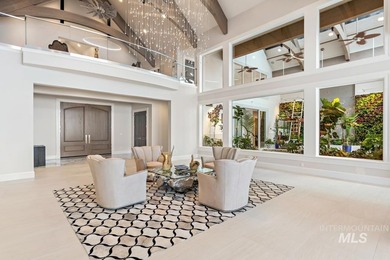Built for entertaining, the kitchen features stunning mirrored - photo 14