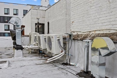 The Bedford Flats is a mixed-use investment comprised of two - photo 26