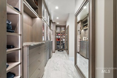Built for entertaining, the kitchen features stunning mirrored - photo 29