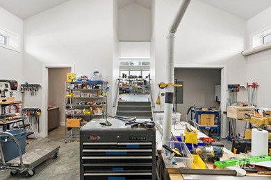 Built for entertaining, the kitchen features stunning mirrored - photo 43