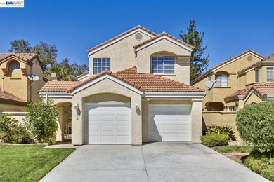 Welcome to this stunning single-family home in the gated - photo 1
