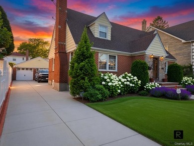 This well-maintained brick two-family home offers an exceptional - photo 1