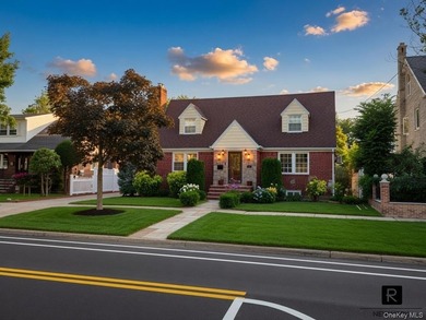 This well-maintained brick two-family home offers an exceptional - photo 3