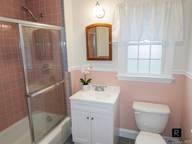 This well-maintained brick two-family home offers an exceptional - photo 5