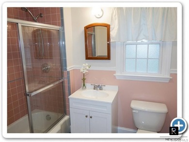This well-maintained brick two-family home offers an exceptional - photo 8