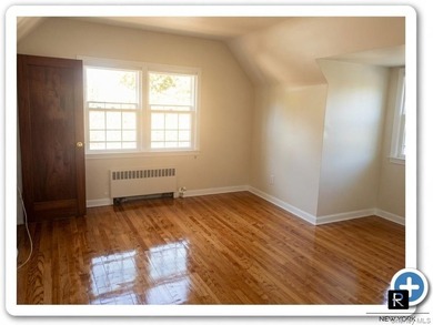 This well-maintained brick two-family home offers an exceptional - photo 9