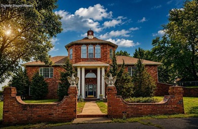 Stately custom brick estate showcasing timeless Classical - photo 1