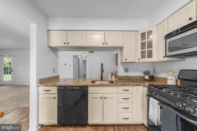 A MUST see move-in ready condo in the well-maintained and - photo 11