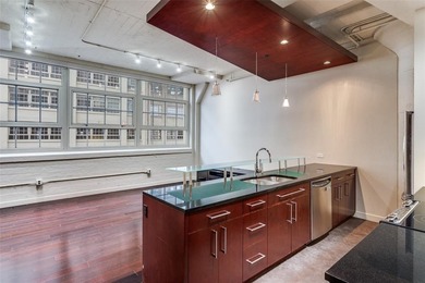 Lock-and-leave living at its finest in the historic Montgomery