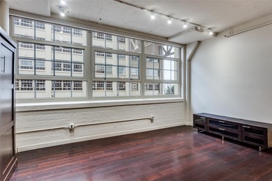 Lock-and-leave living at its finest in the historic Montgomery