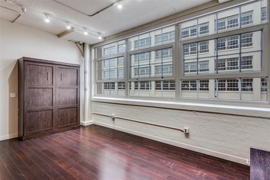 Lock-and-leave living at its finest in the historic Montgomery