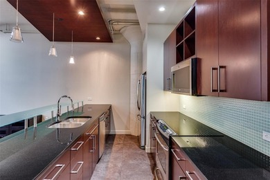 Lock-and-leave living at its finest in the historic Montgomery