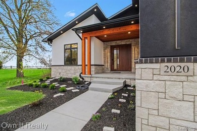 Welcome to this custom-built luxury lakeside ranch offering 3 - photo 5