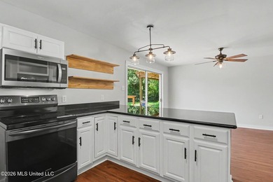 Nestled in the heart of Bayou View, this adorable 2-bedroom - photo 13