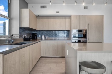 Beach-inspired, high-rise turnkey residence offering a new - photo 11