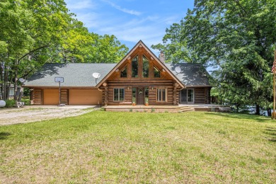 Cool Lake Home For Sale in Irons Michigan