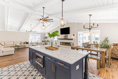 Experience coastal living at its finest in this fully renovated