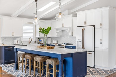 Experience coastal living at its finest in this fully renovated