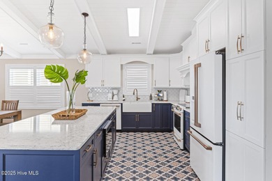 Experience coastal living at its finest in this fully renovated