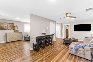 Experience coastal living at its finest in this fully renovated