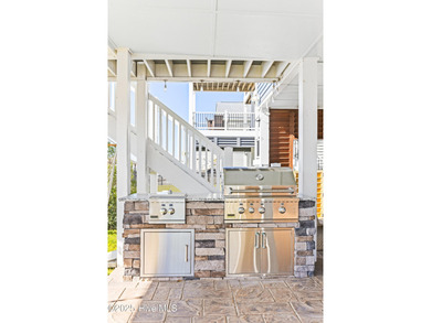 Experience coastal living at its finest in this fully renovated