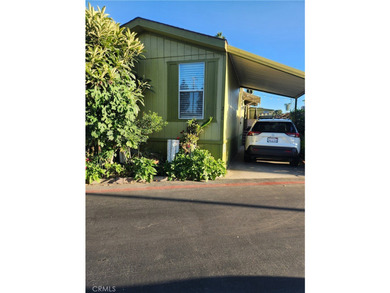 SUPER NICE HOME IN A FAMILY PARK! NESTLED INSIDE THIS SMALL - photo 1