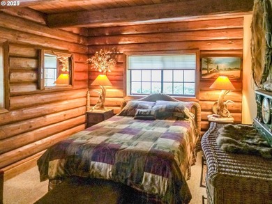 This beautiful log home features soaring ceilings and large - photo 14
