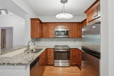 Welcome to this bright and inviting two-bedroom condo, ideally