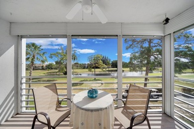 With Lake & Golf views... this corner 3 bdrm, 2 bath condo in - photo 2