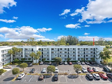 With Lake & Golf views... this corner 3 bdrm, 2 bath condo in - photo 3