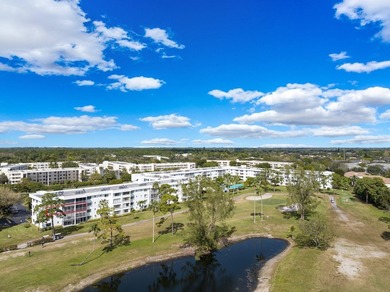 With Lake & Golf views... this corner 3 bdrm, 2 bath condo in - photo 5