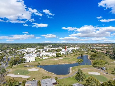 With Lake & Golf views... this corner 3 bdrm, 2 bath condo in - photo 6