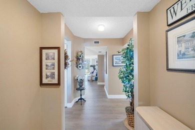 With Lake & Golf views... this corner 3 bdrm, 2 bath condo in - photo 8
