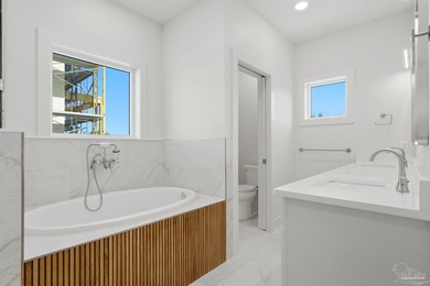 Newly completed in 2026, this stunning corner-lot beach home - photo 23