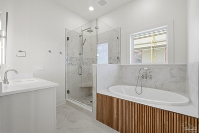 Newly completed in 2026, this stunning corner-lot beach home - photo 41