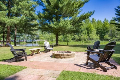 Enjoy 100 feet of owned frontage on Castle Rock Lake with this - photo 9