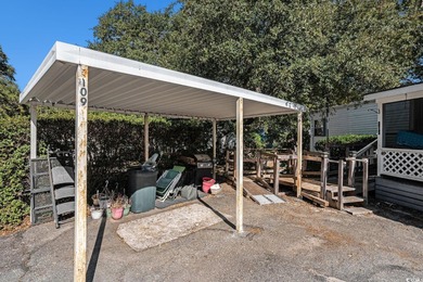 This charming 2-bedroom, 2-bath home in Inlet Oaks Village