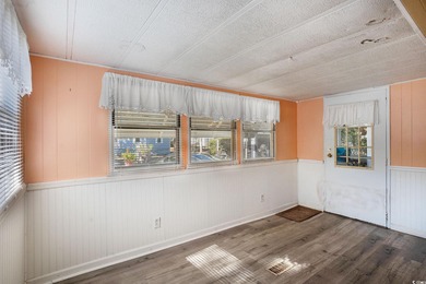 This charming 2-bedroom, 2-bath home in Inlet Oaks Village