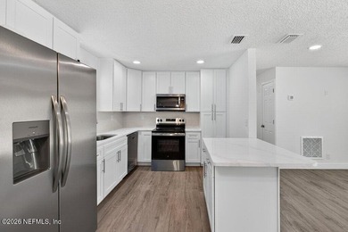 FULL BRICK 4-bedroom, 3-bath REVITALIZED FROM TOP TO BOTTOM in - photo 8