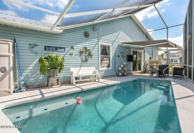 This beautifully updated canal-front pool home in Port Orange - photo 3