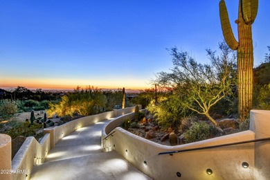 Nestled against a dramatic mountain backdrop and framed by