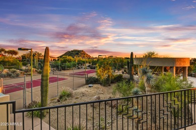 Nestled against a dramatic mountain backdrop and framed by