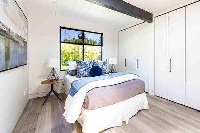 Completely renovated, this exceptional home blends iconic design - photo 15