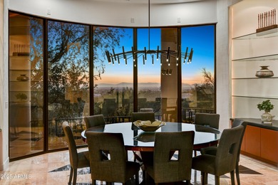 Nestled against a dramatic mountain backdrop and framed by