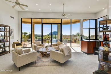 Nestled against a dramatic mountain backdrop and framed by